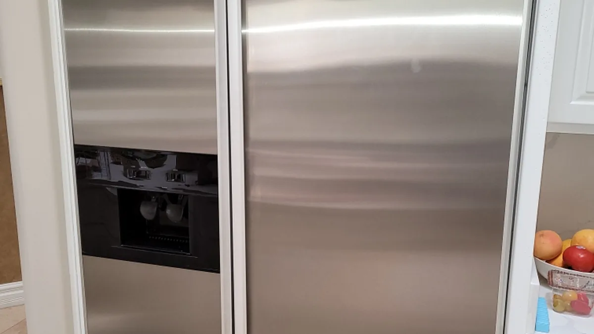Factory-certified appliance repair technician servicing luxury refrigeration, laundry suites, and cooking ranges in San Jose, CA